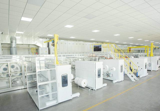 What is the production capacity of a sanitary pad machine